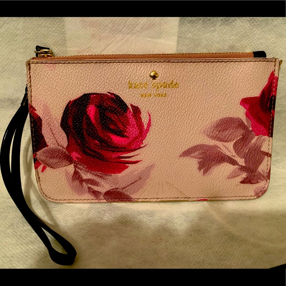 Kate spade wristlet pink and roses.